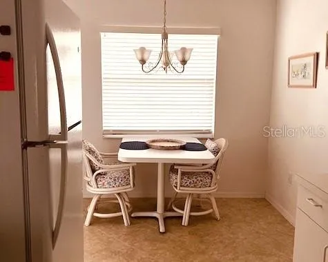 a table and chairs in a room