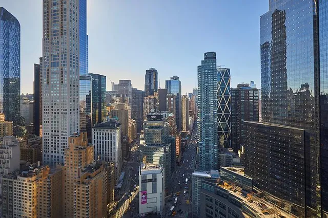 a view of a city with tall buildings