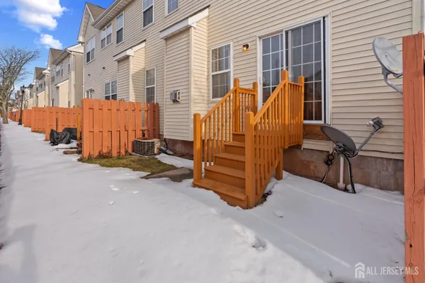 a view of a balcony with chairs