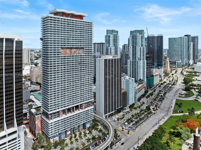 a view of a city with tall buildings