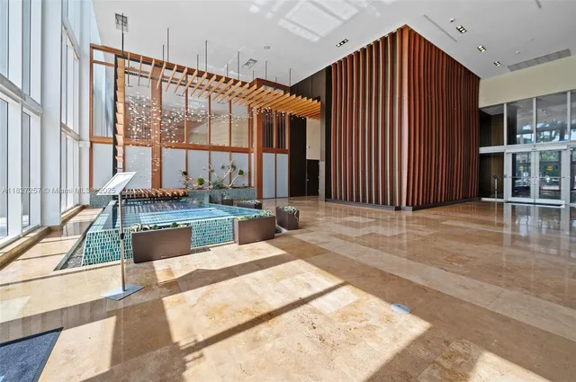 a view of swimming pool with seating space