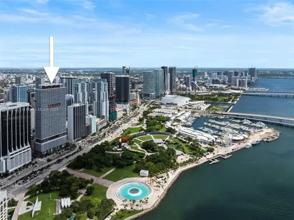 a view of a balcony with two chairs and a table