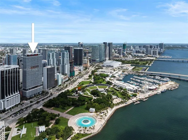 a view of a balcony with two chairs and a table