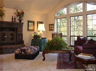 2172 Green Hill Road Sebastopol, CA 95472 - Photo 4 of 12 a living room with furniture and a fireplace