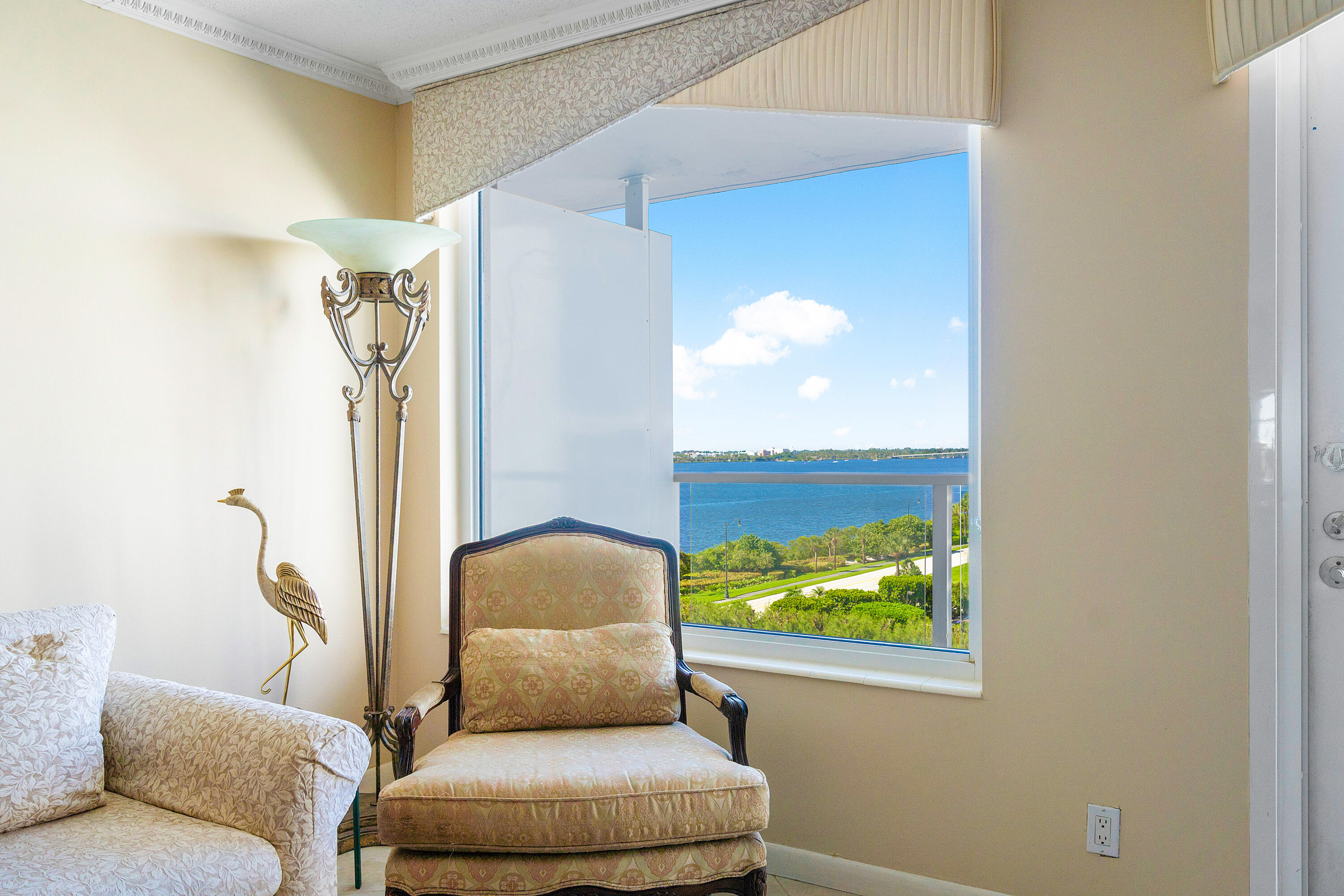 3450 South Ocean Boulevard, Unit 625 Palm Beach, FL 33480 - Photo 14 of 43 a living room with furniture and a window