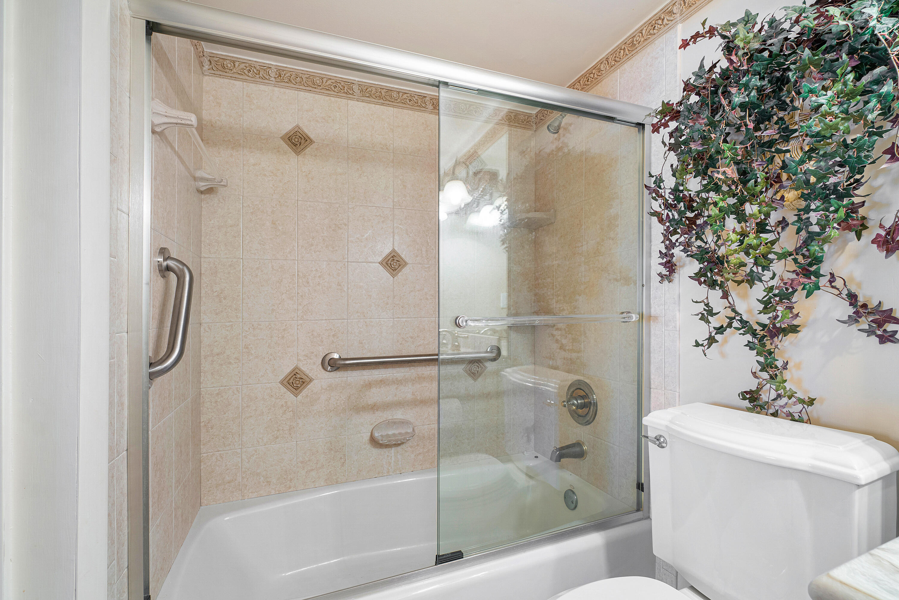 3450 South Ocean Boulevard, Unit 625 Palm Beach, FL 33480 - Photo 20 of 43 a bathroom with a shower and a toilet