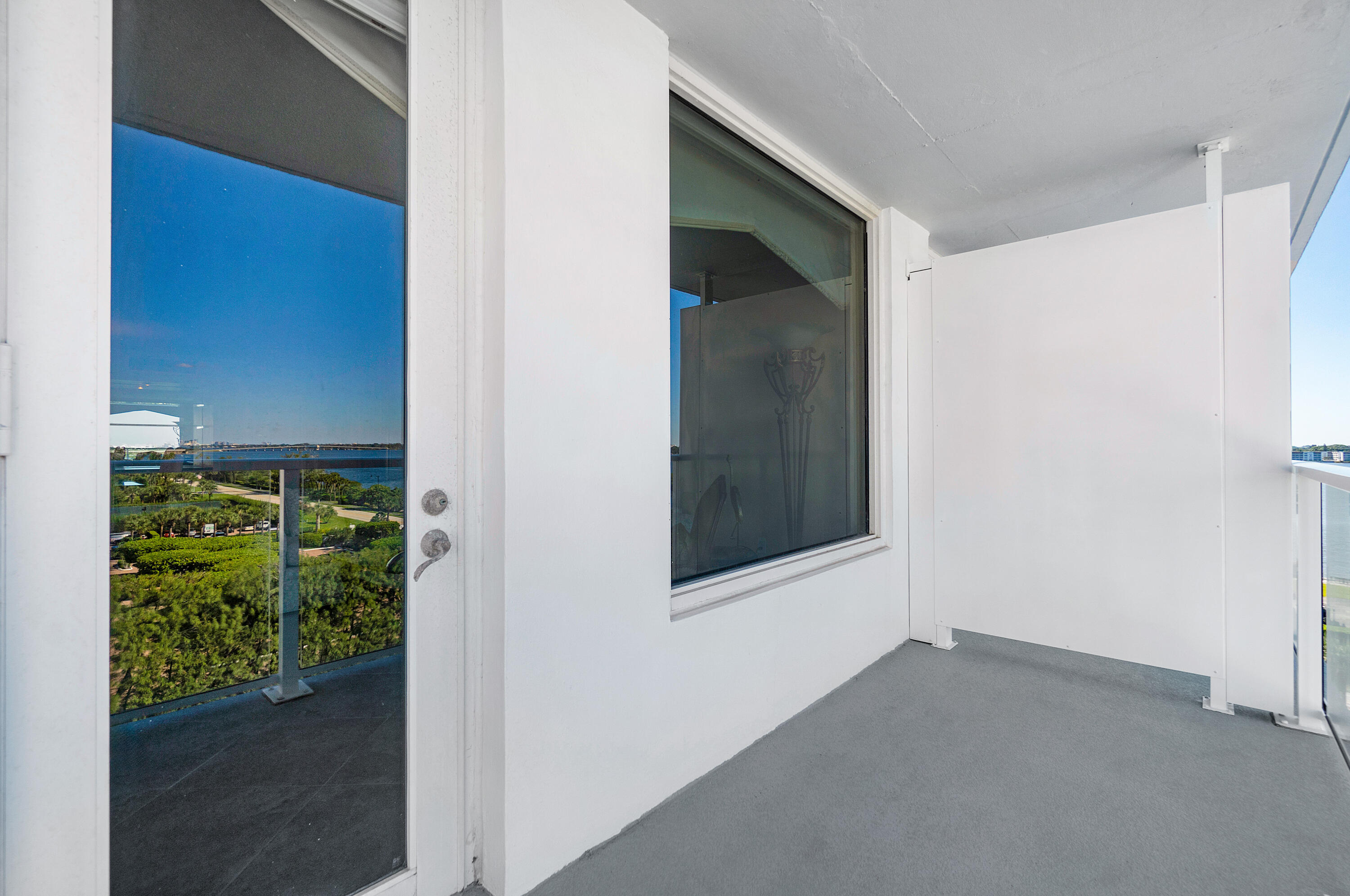 3450 South Ocean Boulevard, Unit 625 Palm Beach, FL 33480 - Photo 22 of 43 a view of an empty room with a window