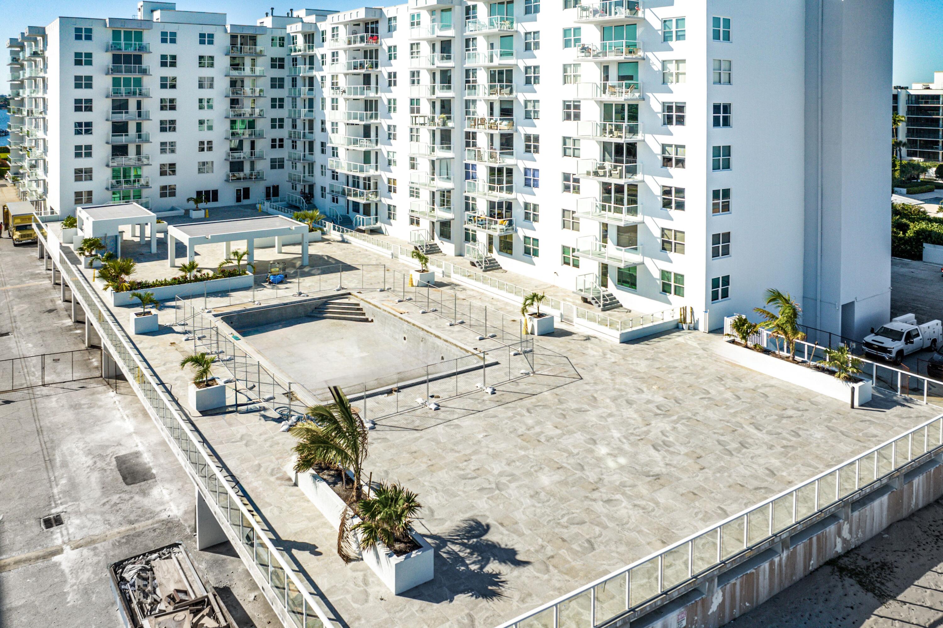 3450 South Ocean Boulevard, Unit 625 Palm Beach, FL 33480 - Photo 27 of 43 a view of a kitchen with granite countertop a sink and a stove