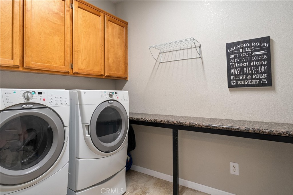 3385 Keefer Road Chico, CA 95973 - Photo 25 of 40 a utility room with dryer and washer