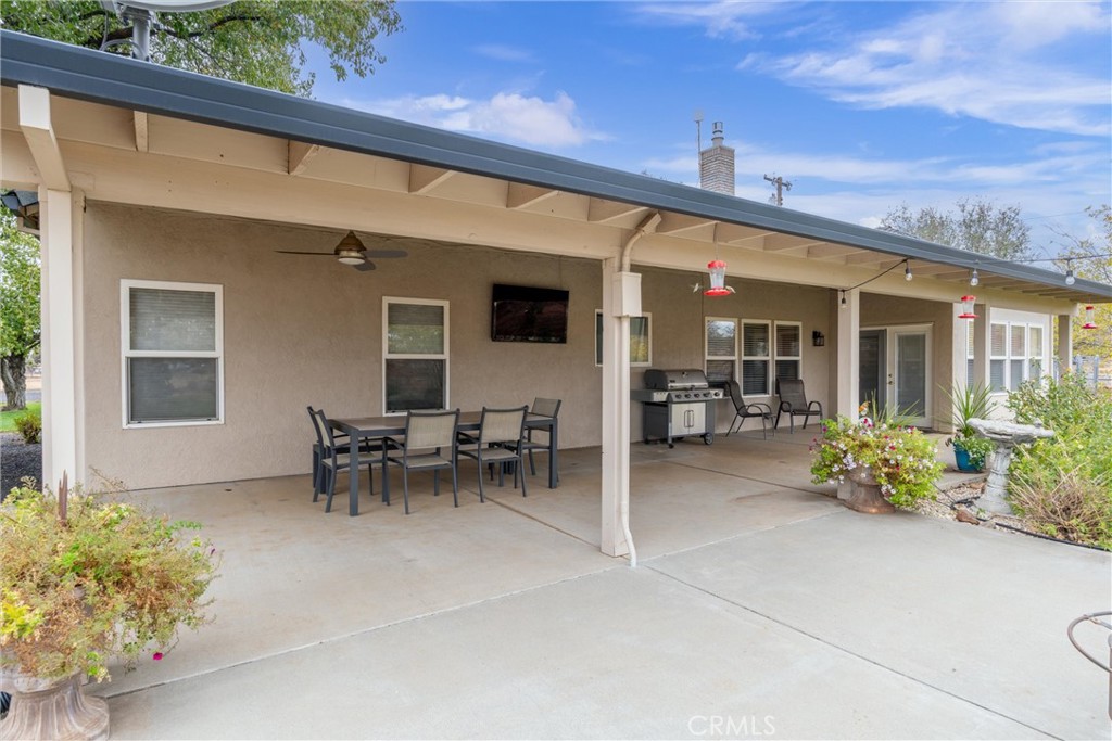 3385 Keefer Road Chico, CA 95973 - Photo 29 of 40 a view of a patio with table and chairs and potted plants
