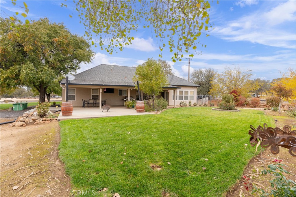3385 Keefer Road Chico, CA 95973 - Photo 30 of 40 a front view of a house with garden
