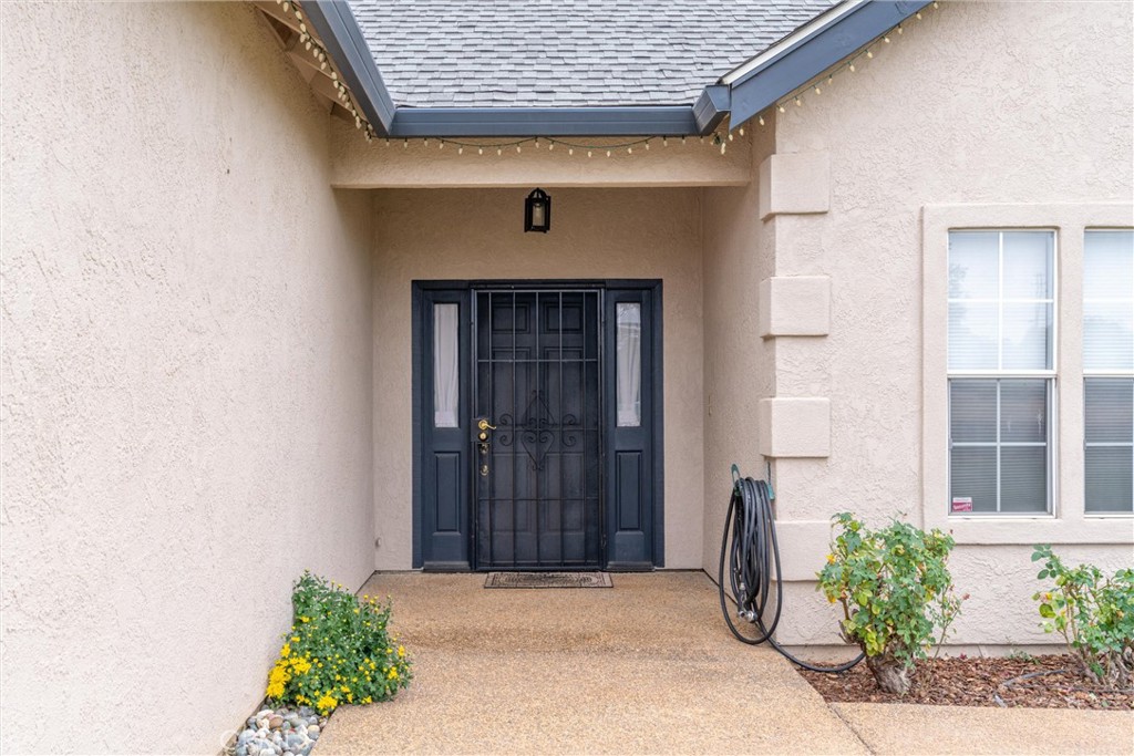 3385 Keefer Road Chico, CA 95973 - Photo 3 of 40 a front view of a house with a garage