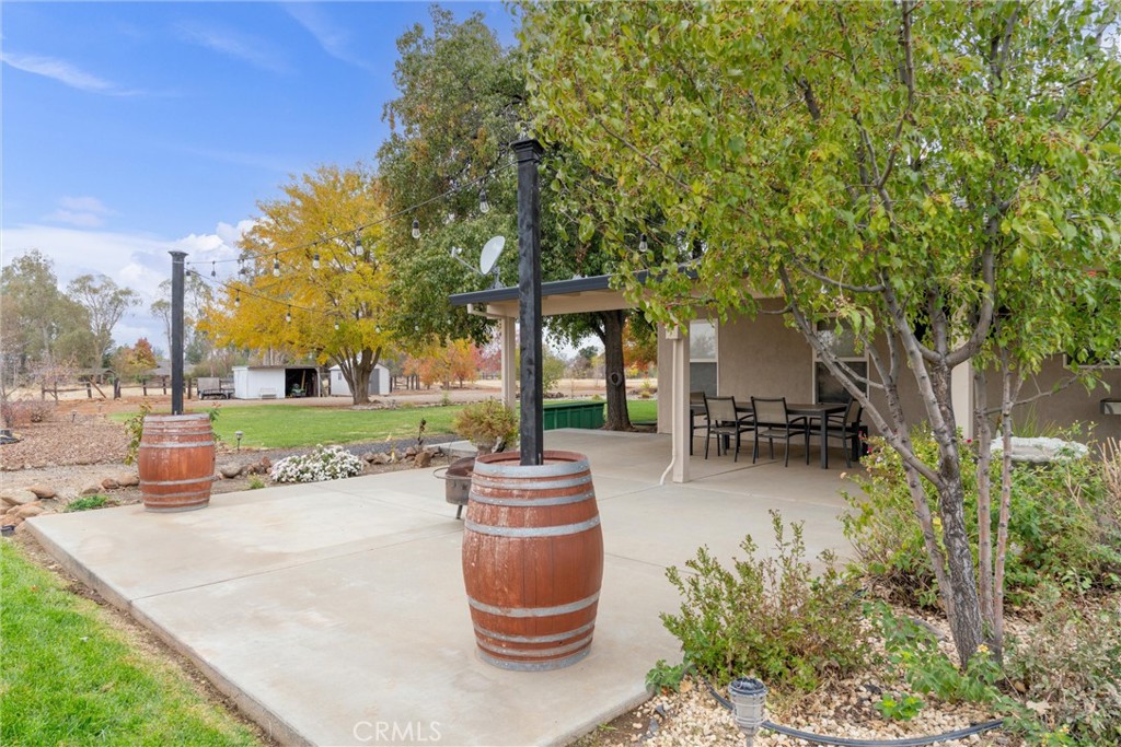3385 Keefer Road Chico, CA 95973 - Photo 33 of 40 a backyard of a house with table and chairs