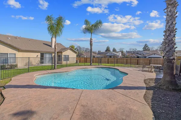 a view of house with backyard and outdoor space