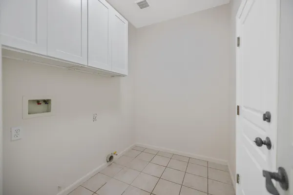 a bathroom with a sink a toilet and bathtub
