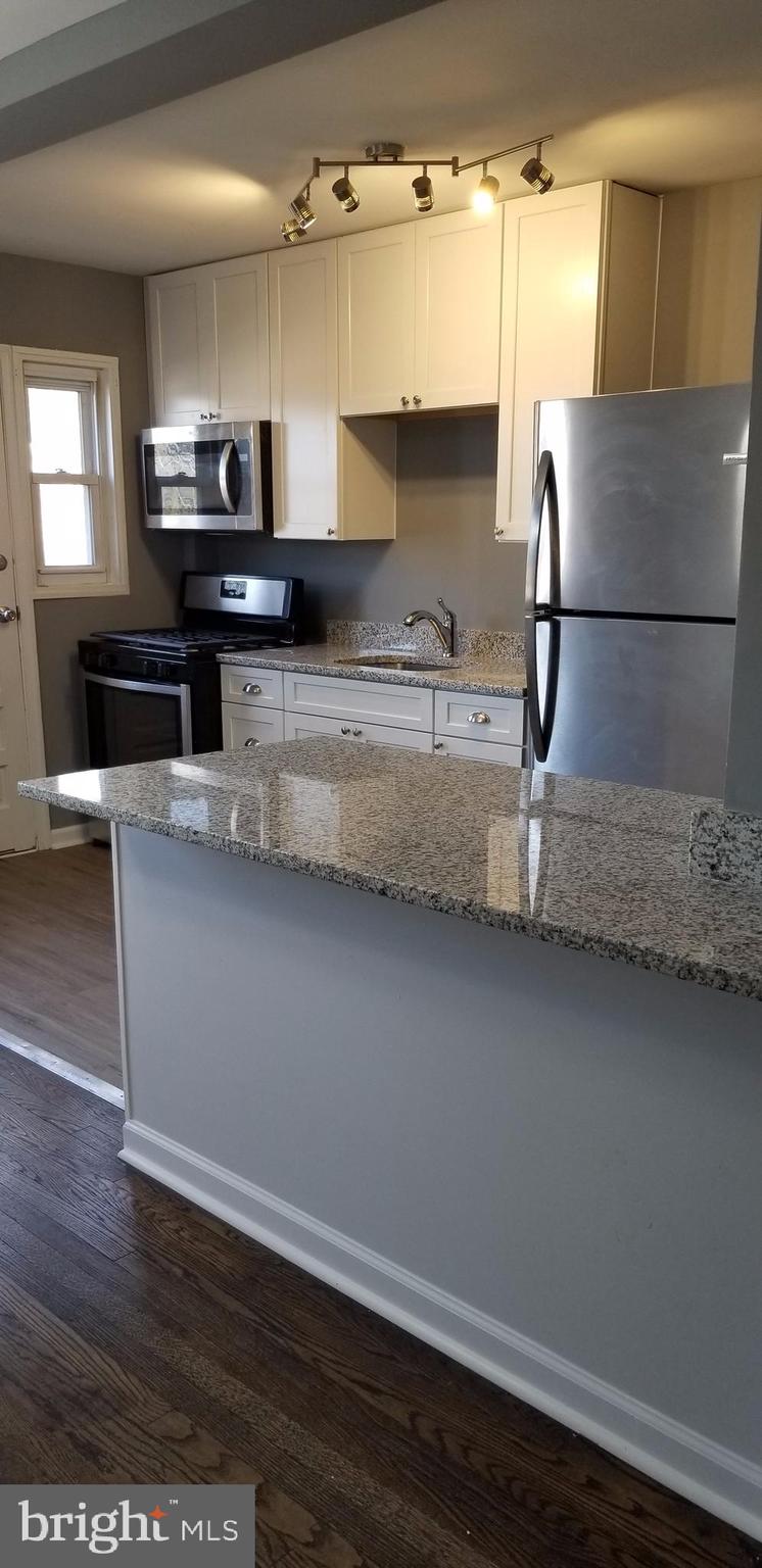 1023 Wedgewood Road Baltimore, MD 21229 - Photo 6 of 15 NEW Kitchen w Granite, SS new Appliances