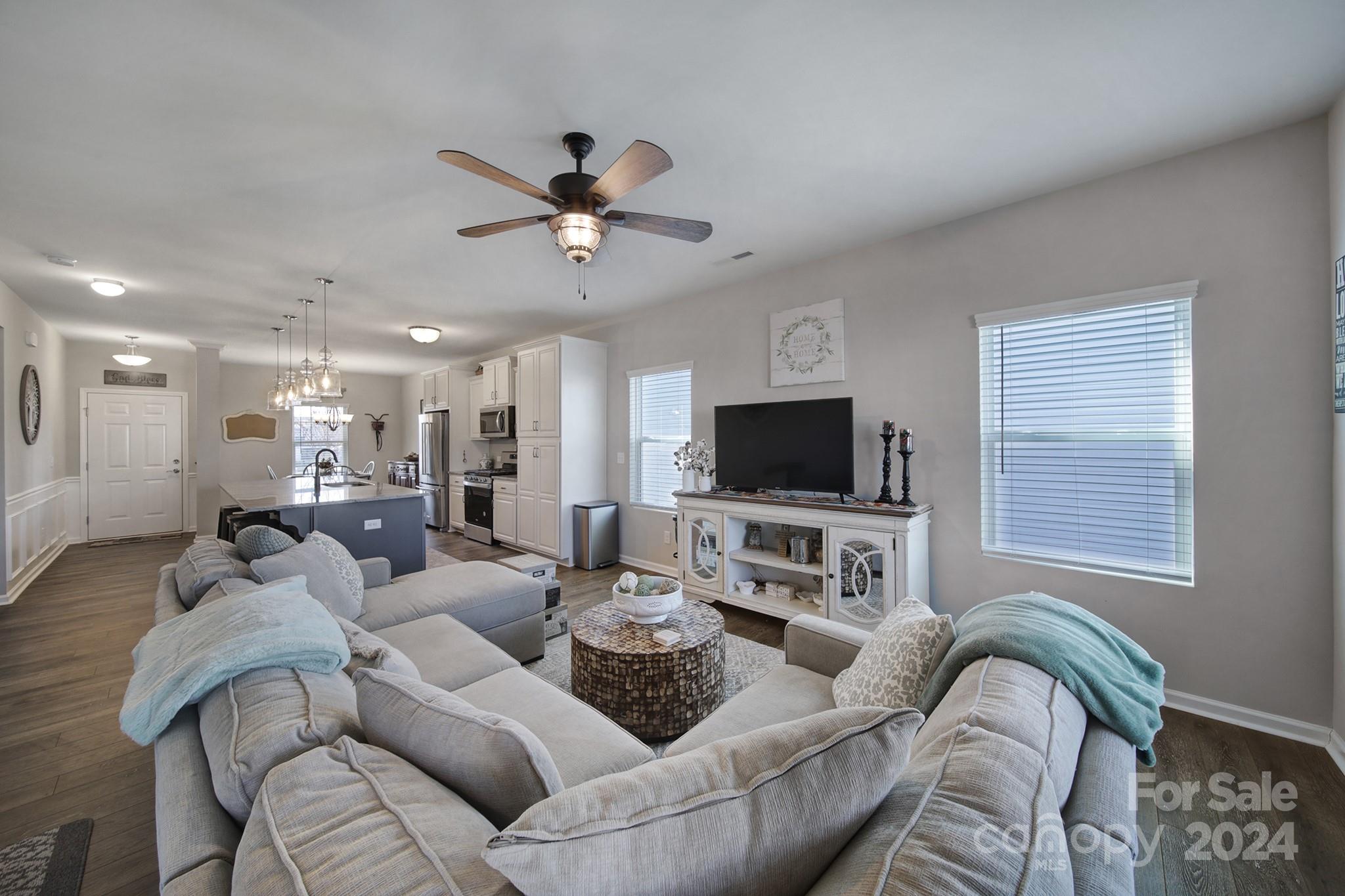 27443 Cinderella Circle Lancaster, SC 29720 - Photo 11 of 37 a living room with furniture and a flat screen tv