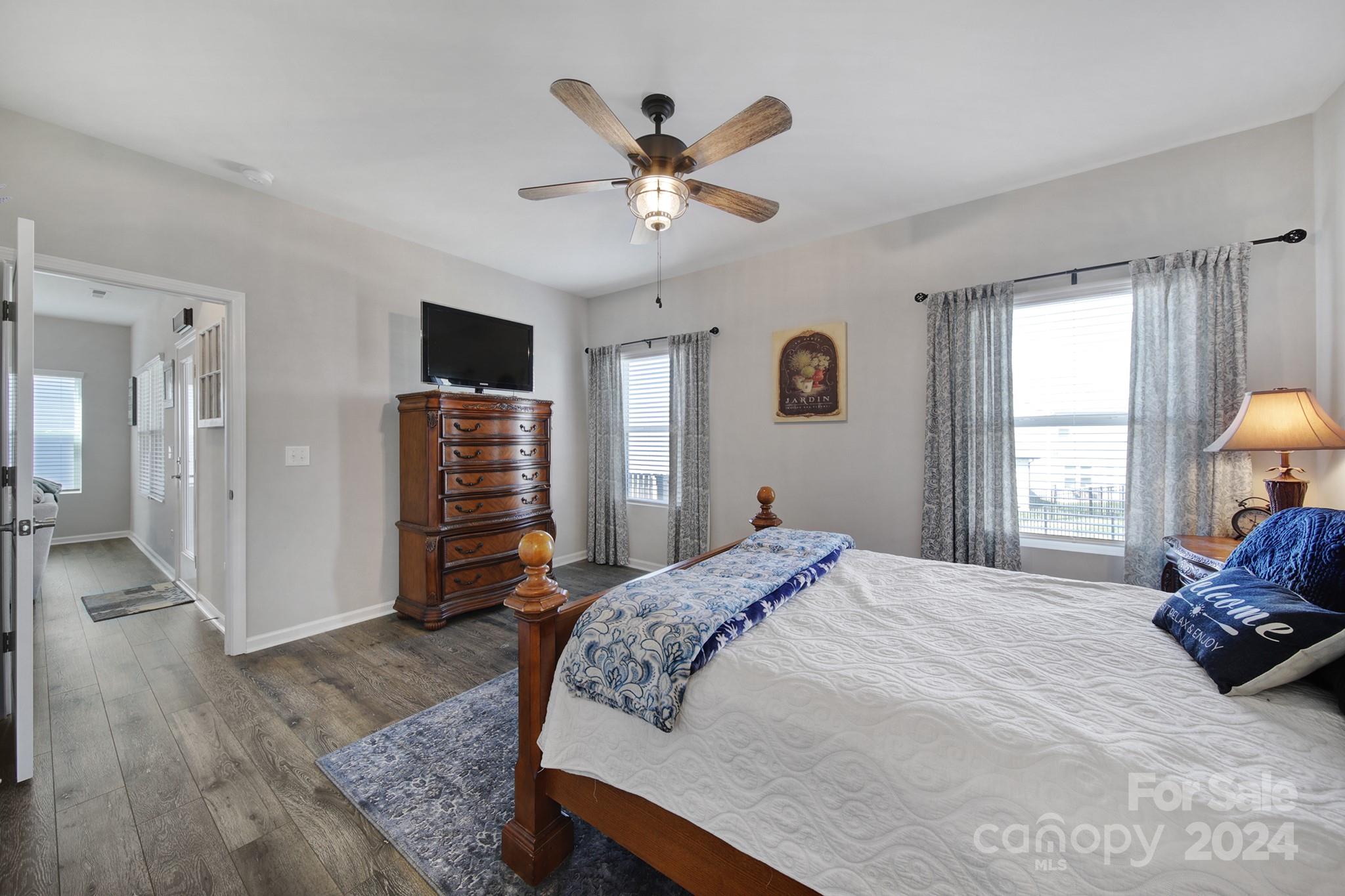 27443 Cinderella Circle Lancaster, SC 29720 - Photo 15 of 37 a bedroom with a bed and a ceiling fan