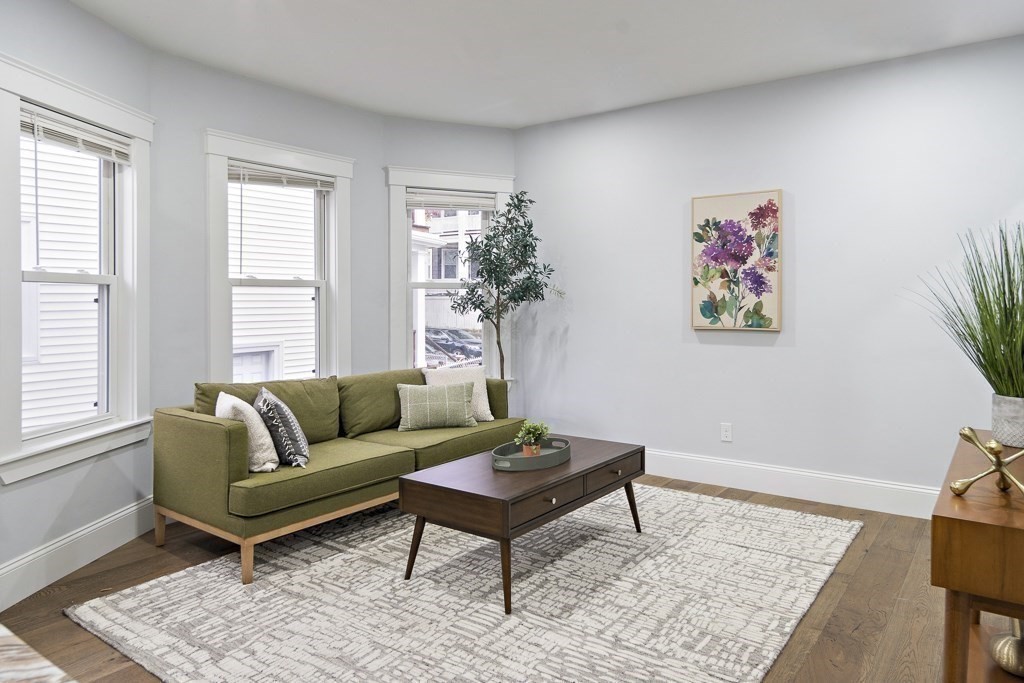 75 Tower Street, Unit 2 Boston, MA 02130 - Photo 4 of 15 a living room with furniture and a potted plant