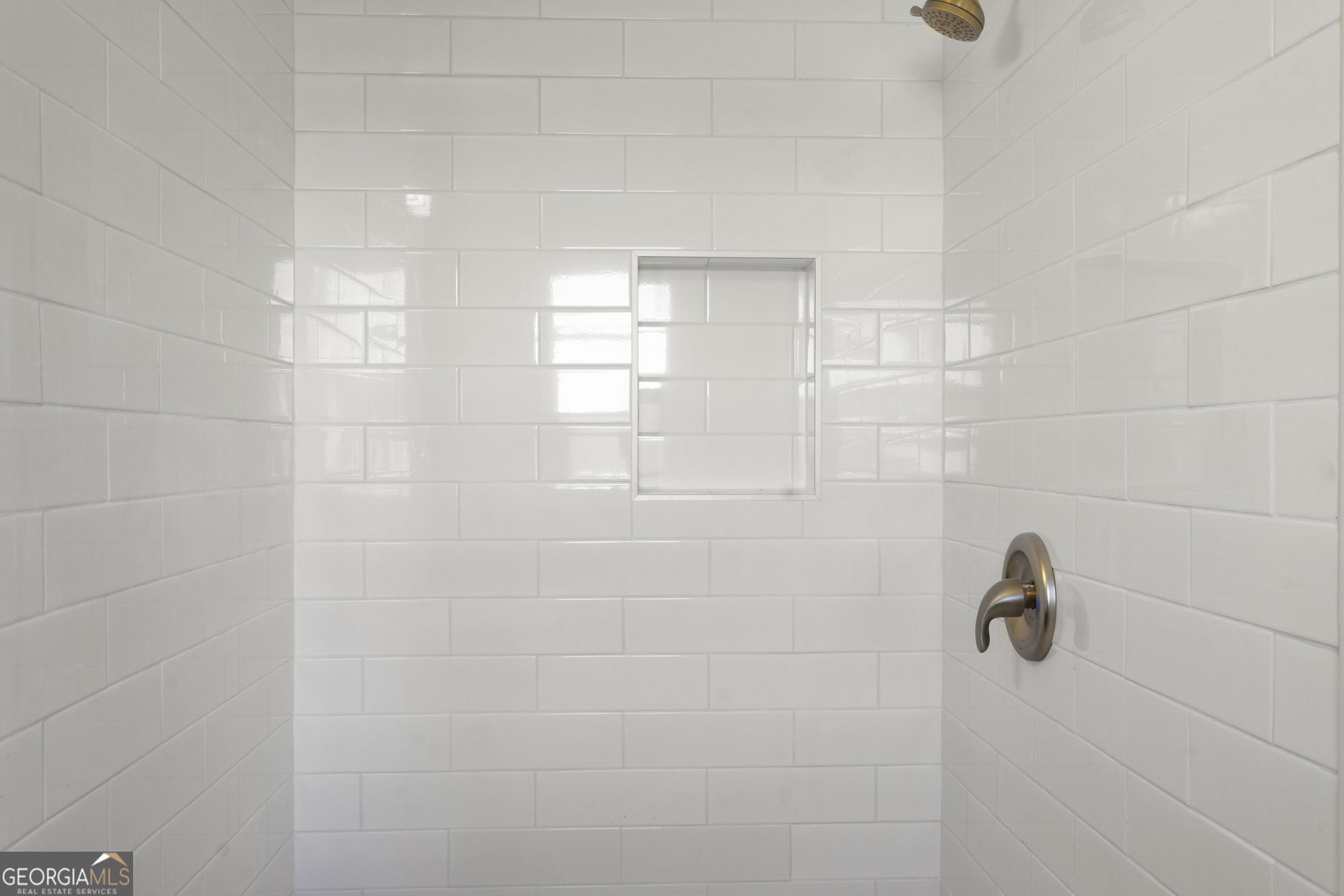 1423 Tucker Road Perry, GA 31069 - Photo 15 of 37 a bathroom with a shower