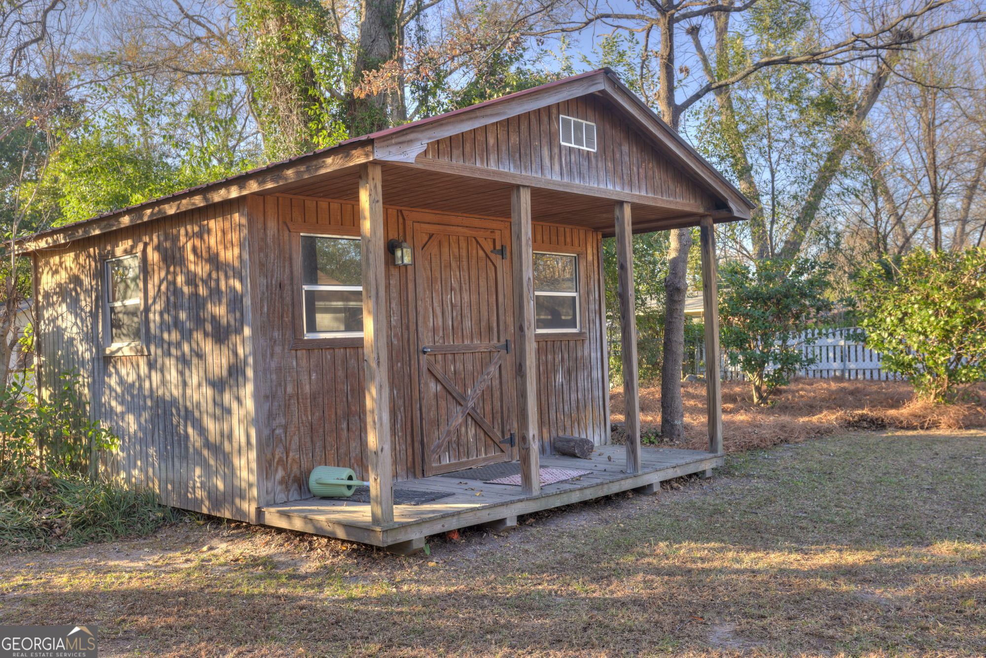 1423 Tucker Road Perry, GA 31069 - Photo 27 of 37 a front view of a house with a yard