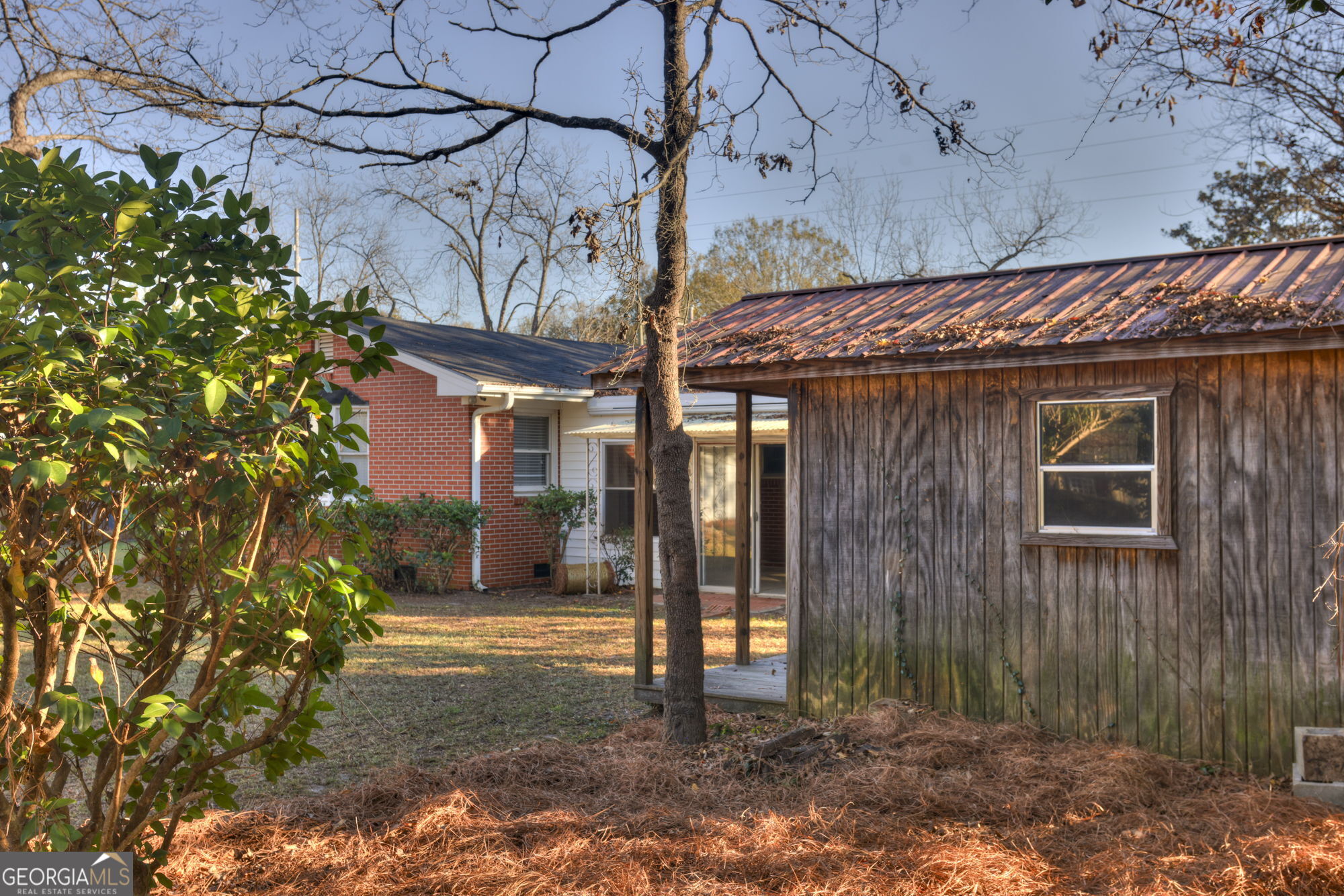 1423 Tucker Road Perry, GA 31069 - Photo 34 of 37 a view of a house with a tree
