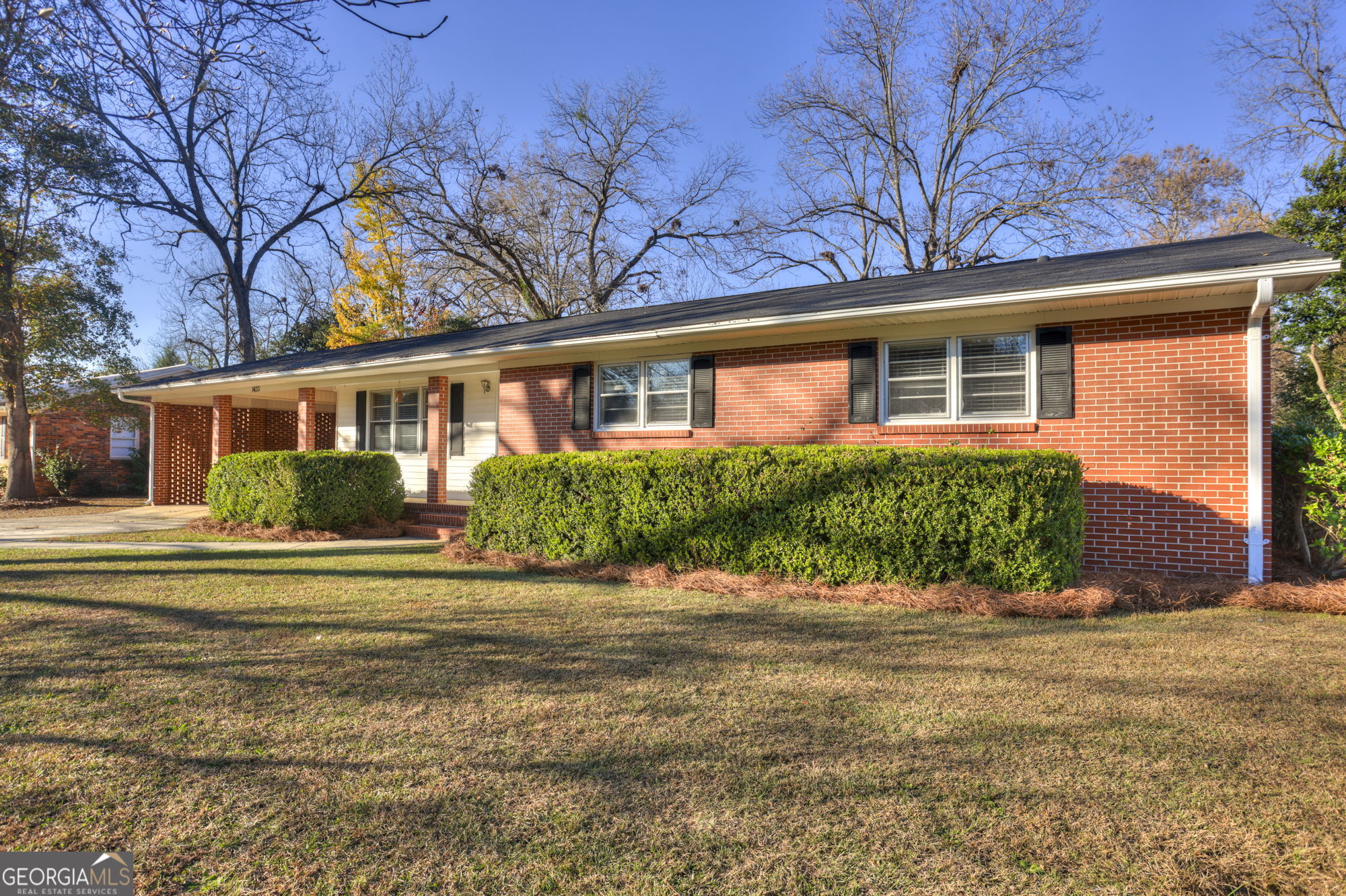 1423 Tucker Road Perry, GA 31069 - Photo 35 of 37 front view of a house with a yard
