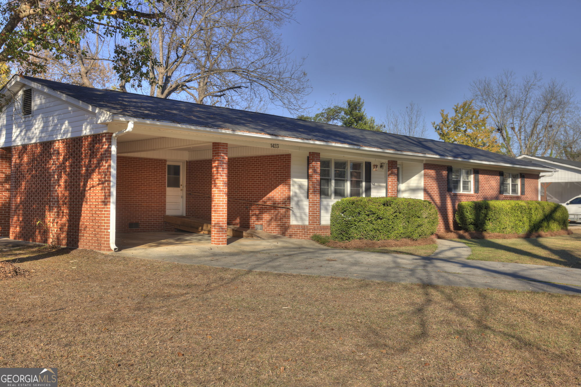1423 Tucker Road Perry, GA 31069 - Photo 37 of 37 a front view of a house with garden