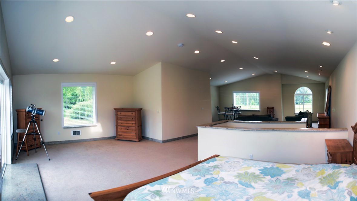 1024 South Machias Road Snohomish, WA 98290 - Photo 14 of 36 a living room with furniture and a flat screen tv