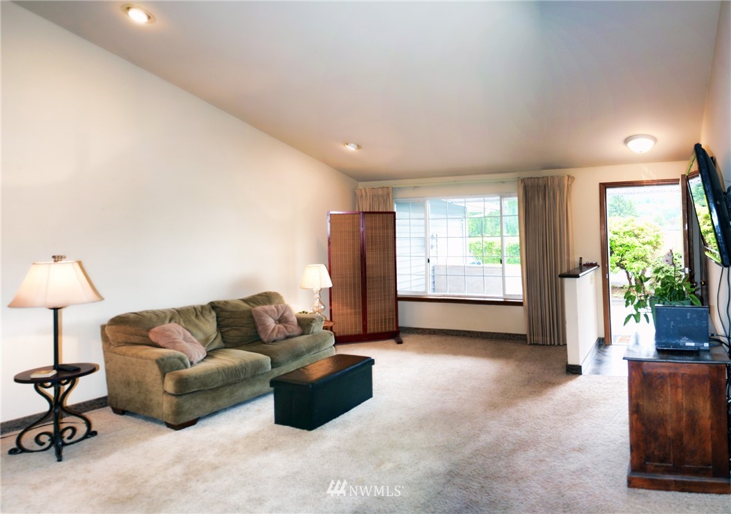 1024 South Machias Road Snohomish, WA 98290 - Photo 3 of 36 a living room with furniture and a window