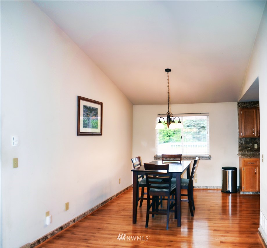 1024 South Machias Road Snohomish, WA 98290 - Photo 4 of 36 a dining room with furniture window and wooden floor