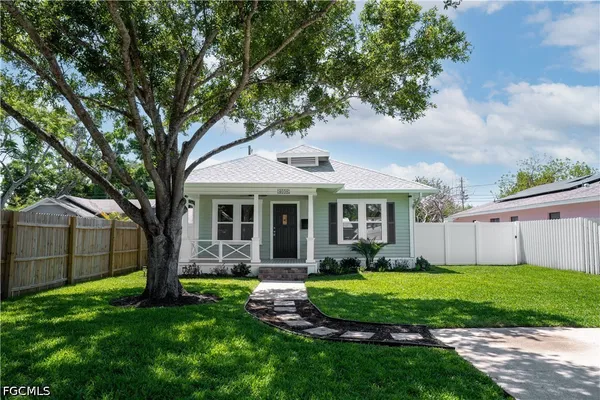 front view of a house with a yard