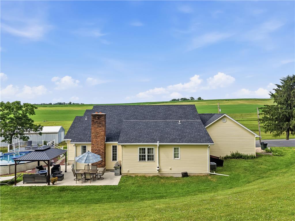 9868 Stagecoach Road Kempton, PA 19529 - Photo 15 of 17 Rural charm meets outdoor entertainment with an inviting pool and patio.