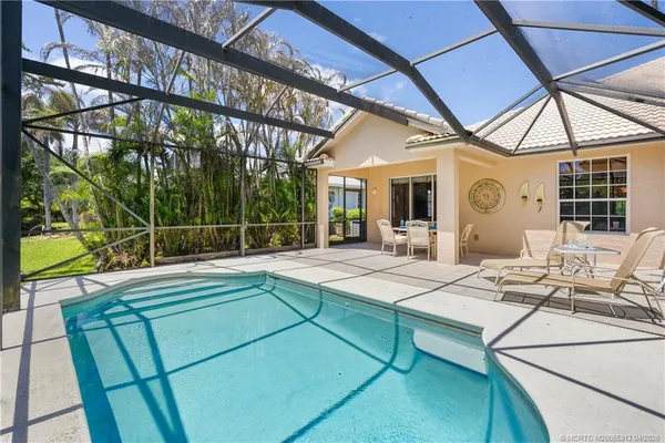 $450,000 | 830 Northwest Red Pine Way, Jensen Beach, FL 34957