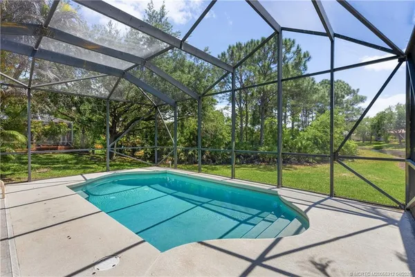 $450,000 | 830 Northwest Red Pine Way, Jensen Beach, FL 34957