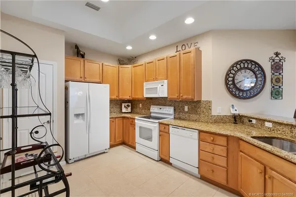 $450,000 | 830 Northwest Red Pine Way, Jensen Beach, FL 34957