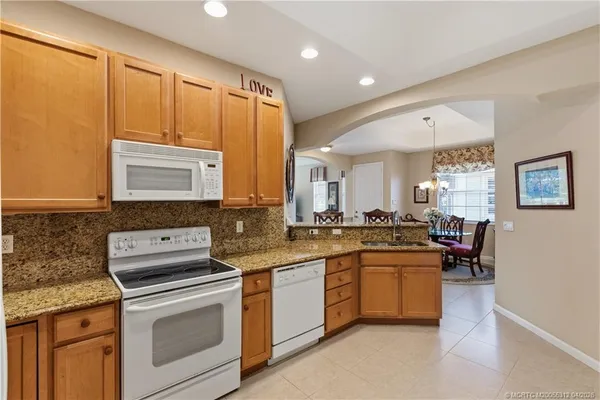 $450,000 | 830 Northwest Red Pine Way, Jensen Beach, FL 34957