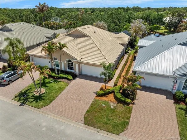$450,000 | 830 Northwest Red Pine Way, Jensen Beach, FL 34957