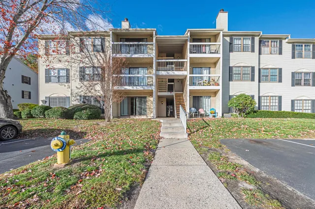 a front view of a building with glass windows