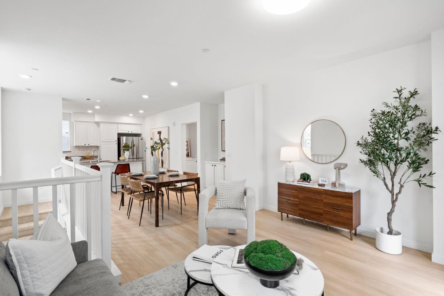 1419 Lavender Loop Milpitas, CA 95035 - Photo 16 of 38 a living room with furniture a dining table and a potted plant