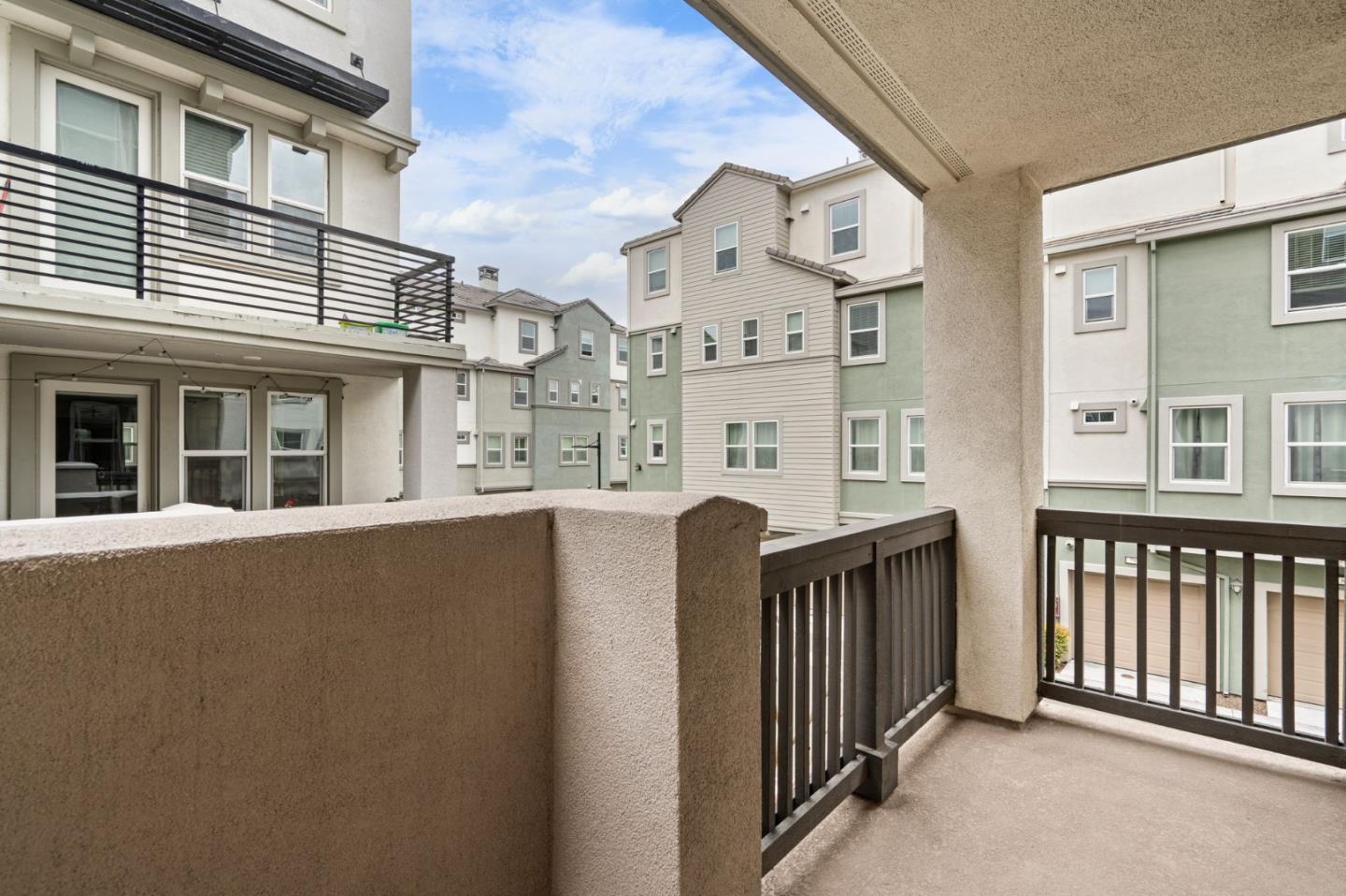 1419 Lavender Loop Milpitas, CA 95035 - Photo 17 of 38 a view of a house with balcony