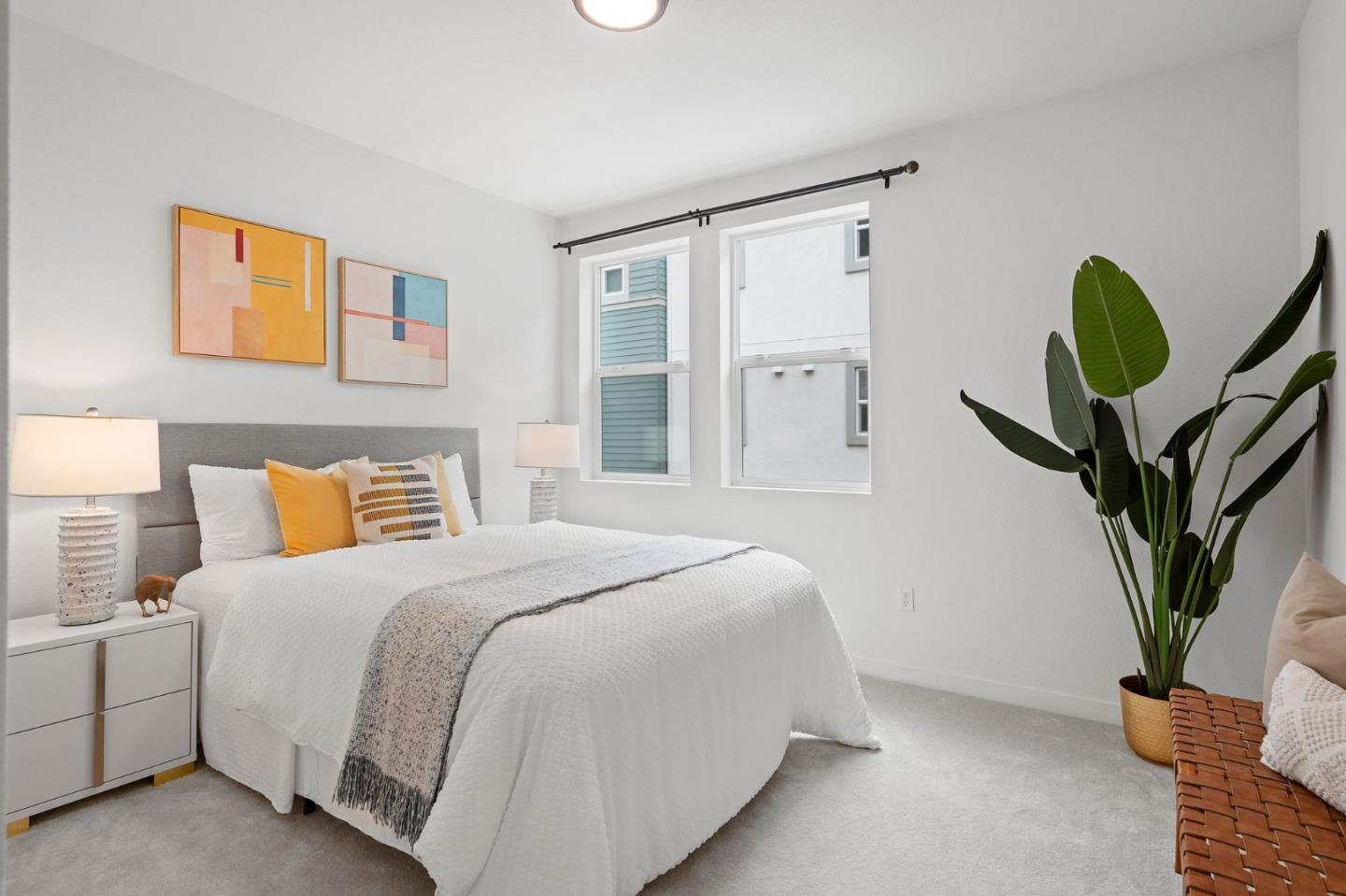 1419 Lavender Loop Milpitas, CA 95035 - Photo 18 of 38 a bedroom with a bed a potted plant and a window