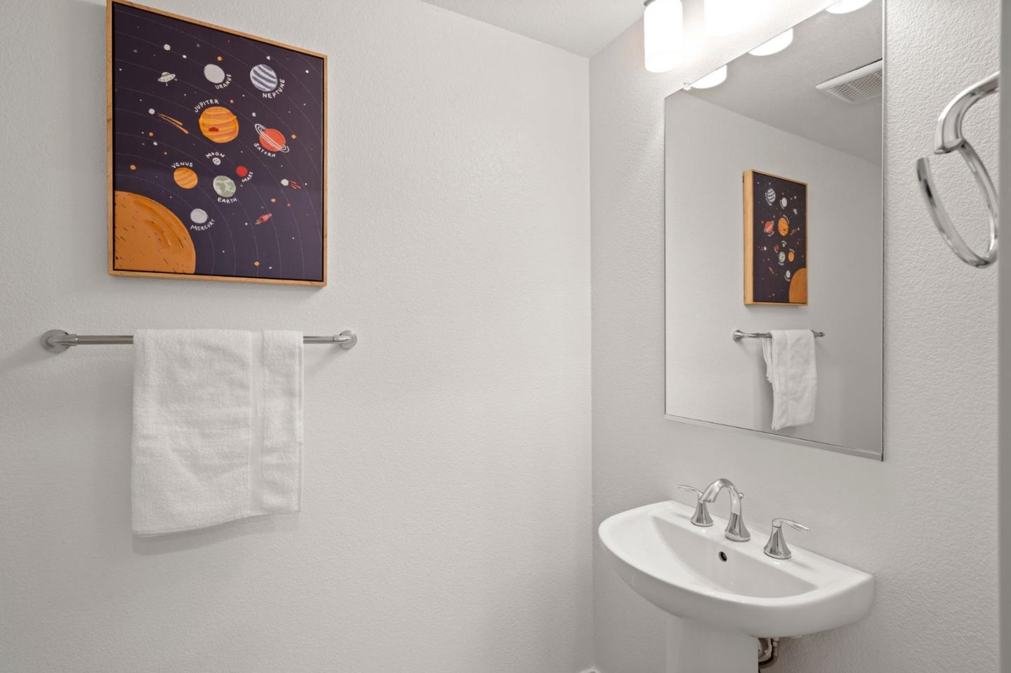 1419 Lavender Loop Milpitas, CA 95035 - Photo 30 of 38 a bathroom with a sink mirror and vanity