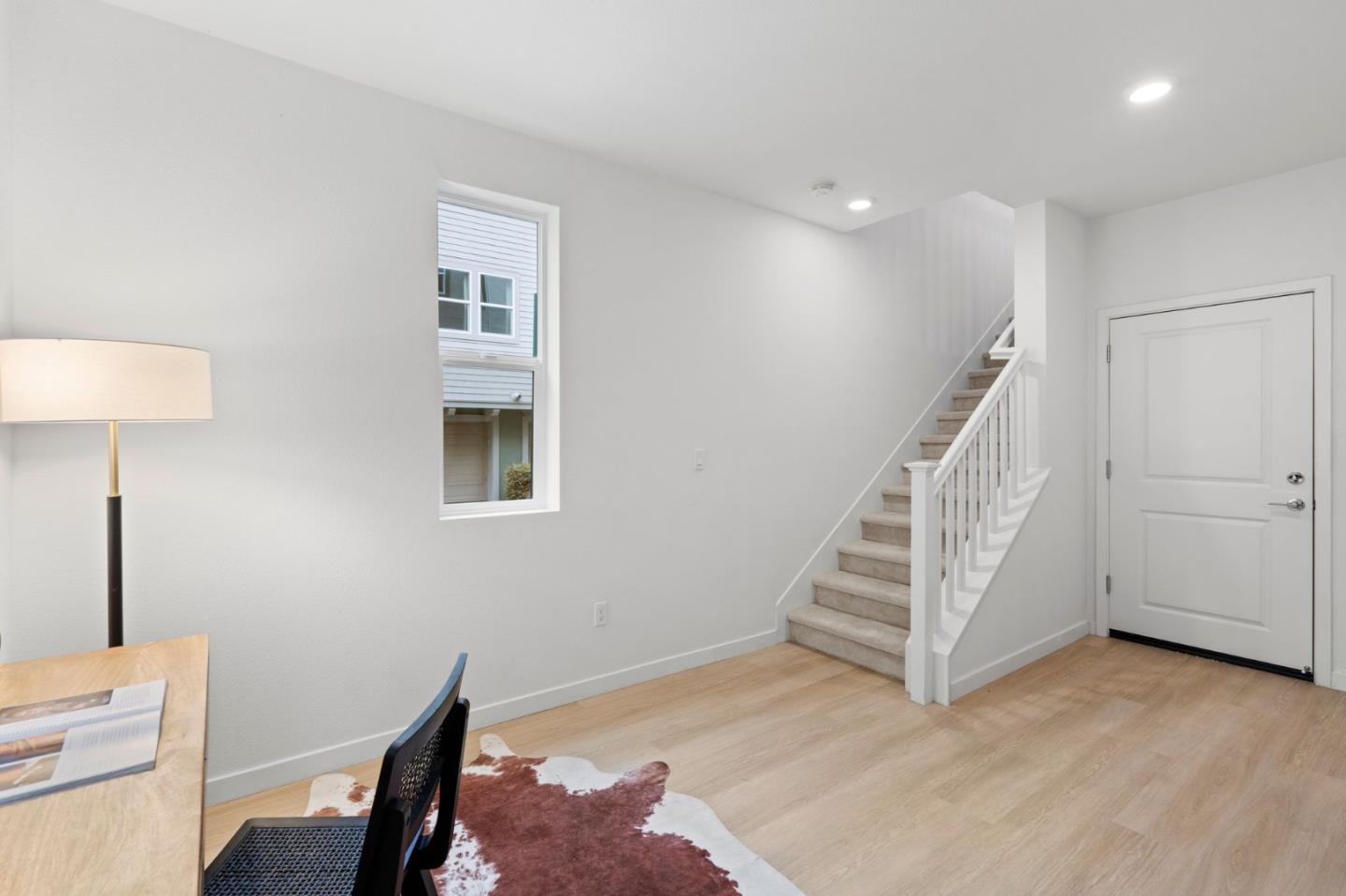 1419 Lavender Loop Milpitas, CA 95035 - Photo 6 of 38 a view of entryway with stairs and wooden floor