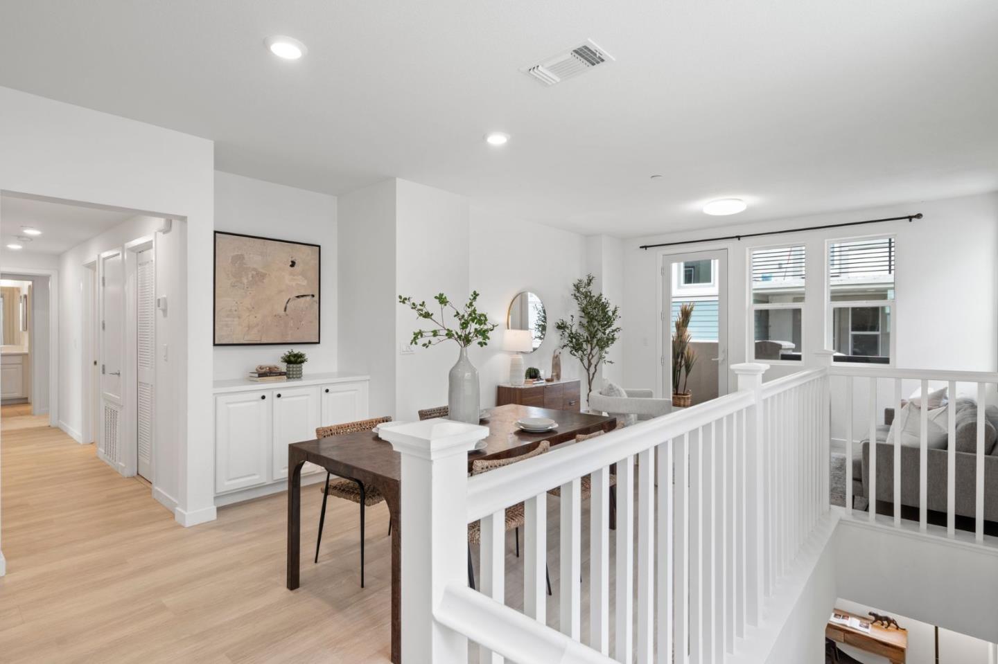 1419 Lavender Loop Milpitas, CA 95035 - Photo 7 of 38 a dining room with furniture potted plants and wooden floor
