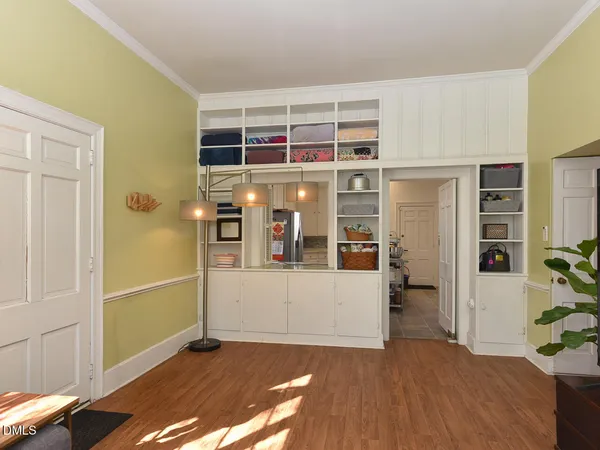 a view of a hallway with seating area