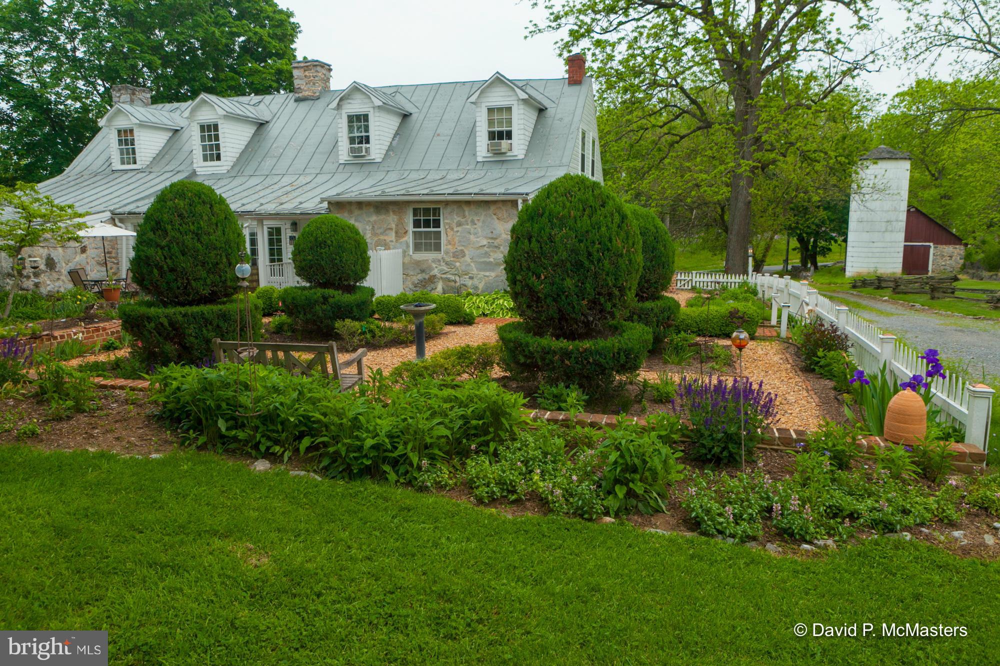 3735 Summit Point Road Charles Town, WV 25414 - Photo 20 of 27 Wonderful gardens. Note topiaries here