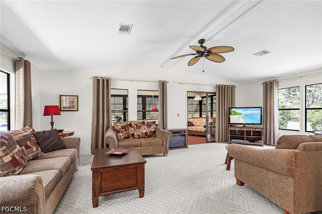 5 Erica Street Alva, FL 33920 - Photo 23 of 37 a living room with furniture ceiling fan and a window