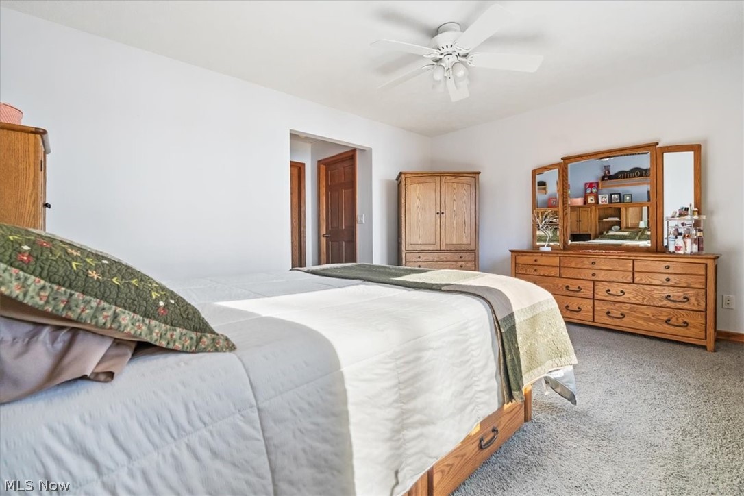4280 Newbury Road Little Hocking, OH 45742 - Photo 25 of 41 Carpeted bedroom with ceiling fan