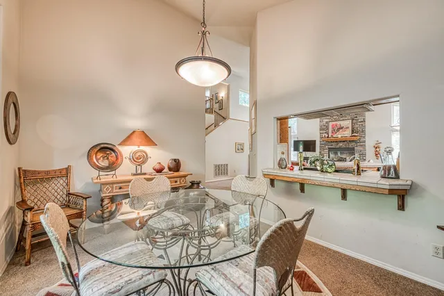 a bedroom with a bed couch and window